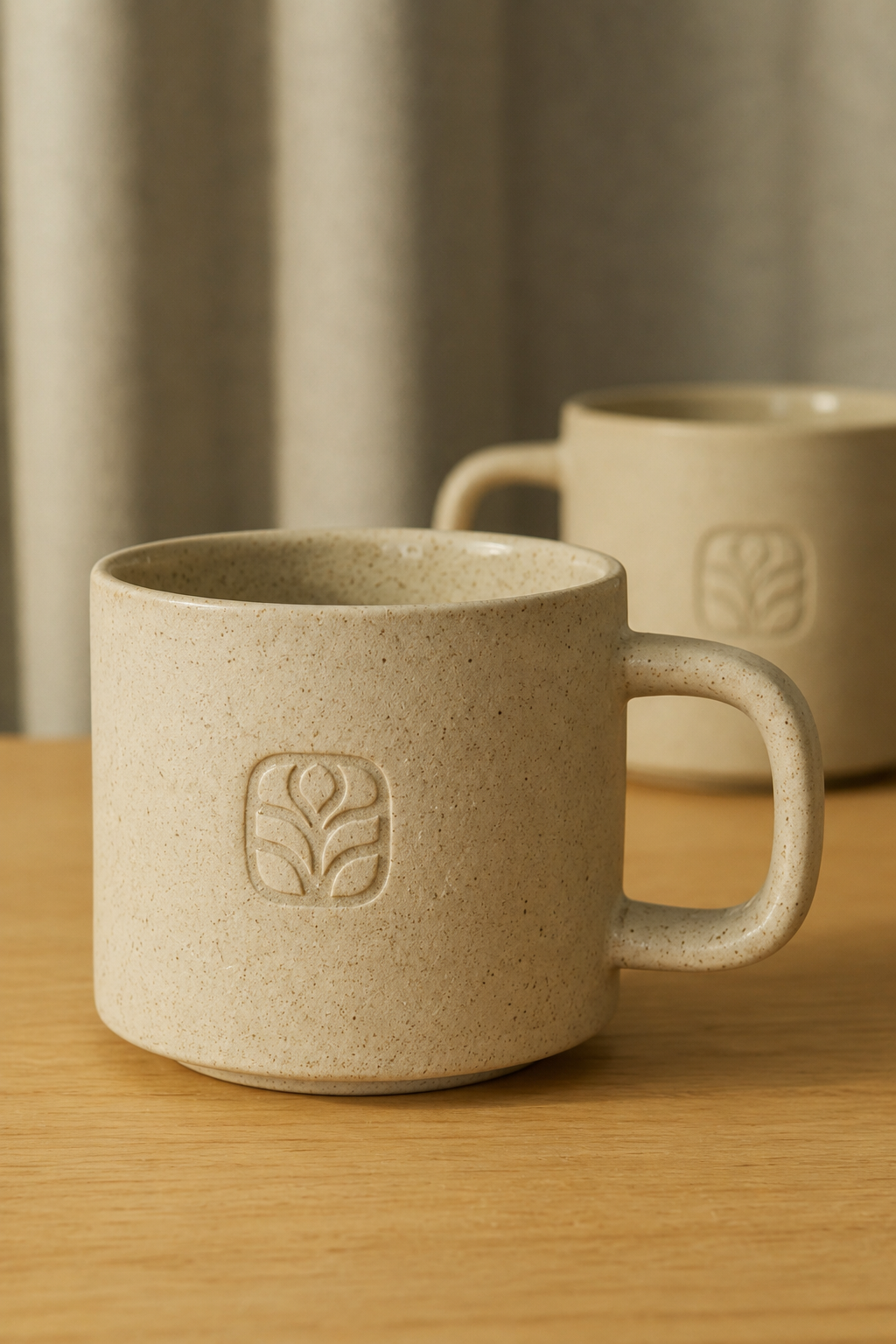 Atlas and Ivy mark debossed into a stoneware mug