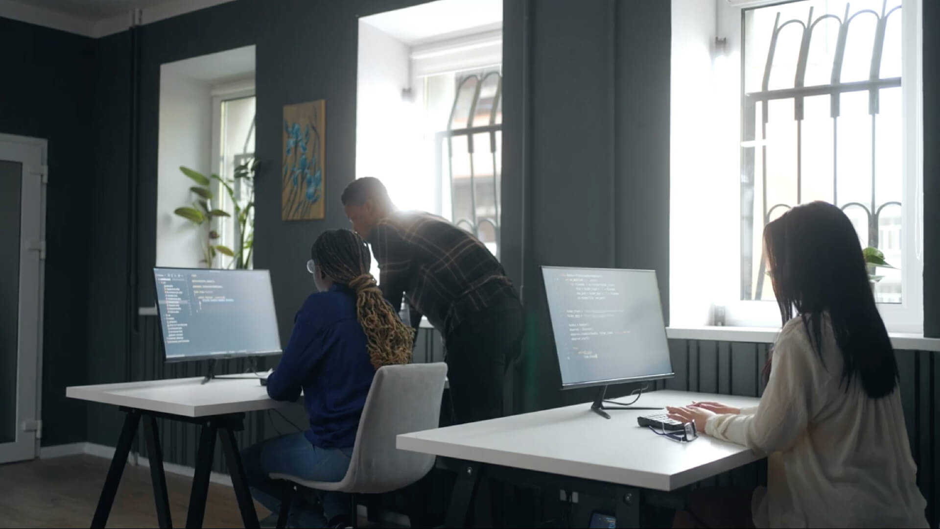 M&S consultants working together in the office