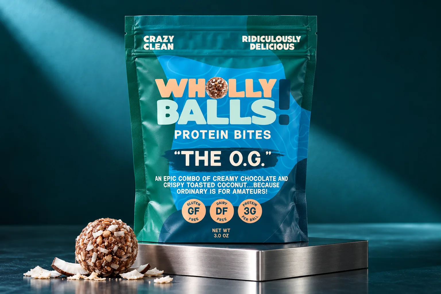 An O.G. pouch on a brushed-steel plinth under a single shaft of light, with a coconut-crusted protein bite beside it